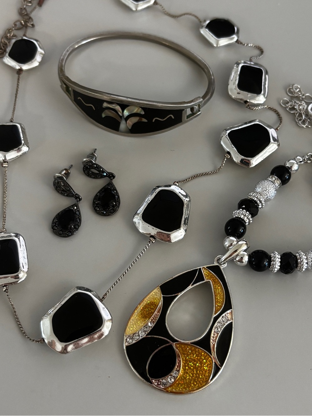 Assorted Black/Silver Jewelry lot w/ Abalone Inlay bracelet & Monet Earring Set
